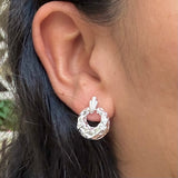 Aretes corona