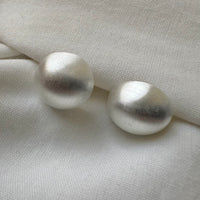 Aretes bolita