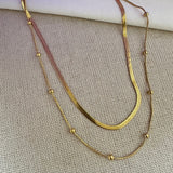 Collar doble con bolitas